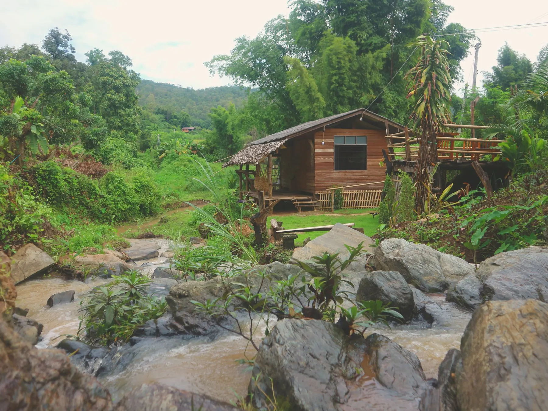 Boulders in the stream in front of the house